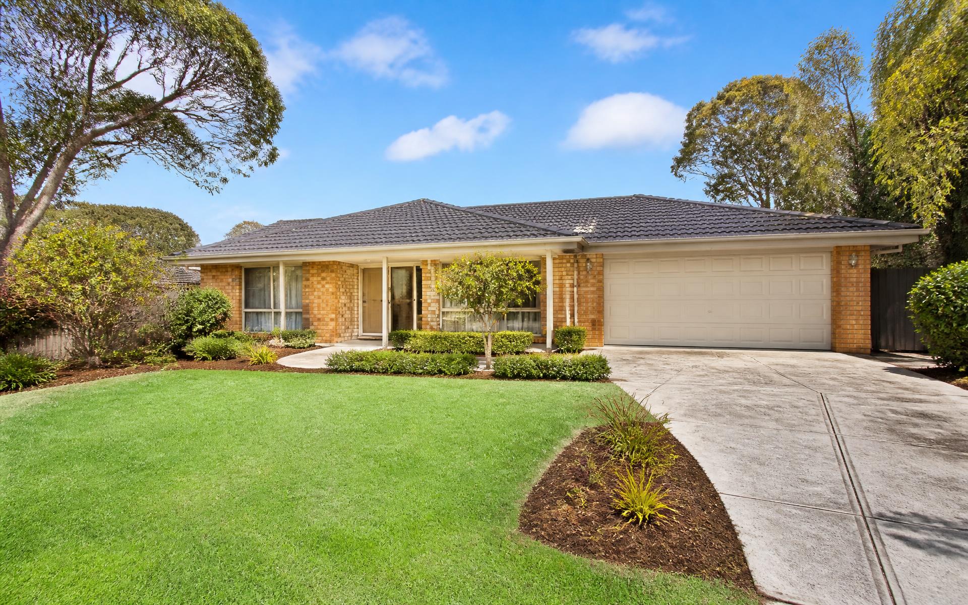 Attractive suburban Melbourne home with a beautifully maintained lawn and tidy garden